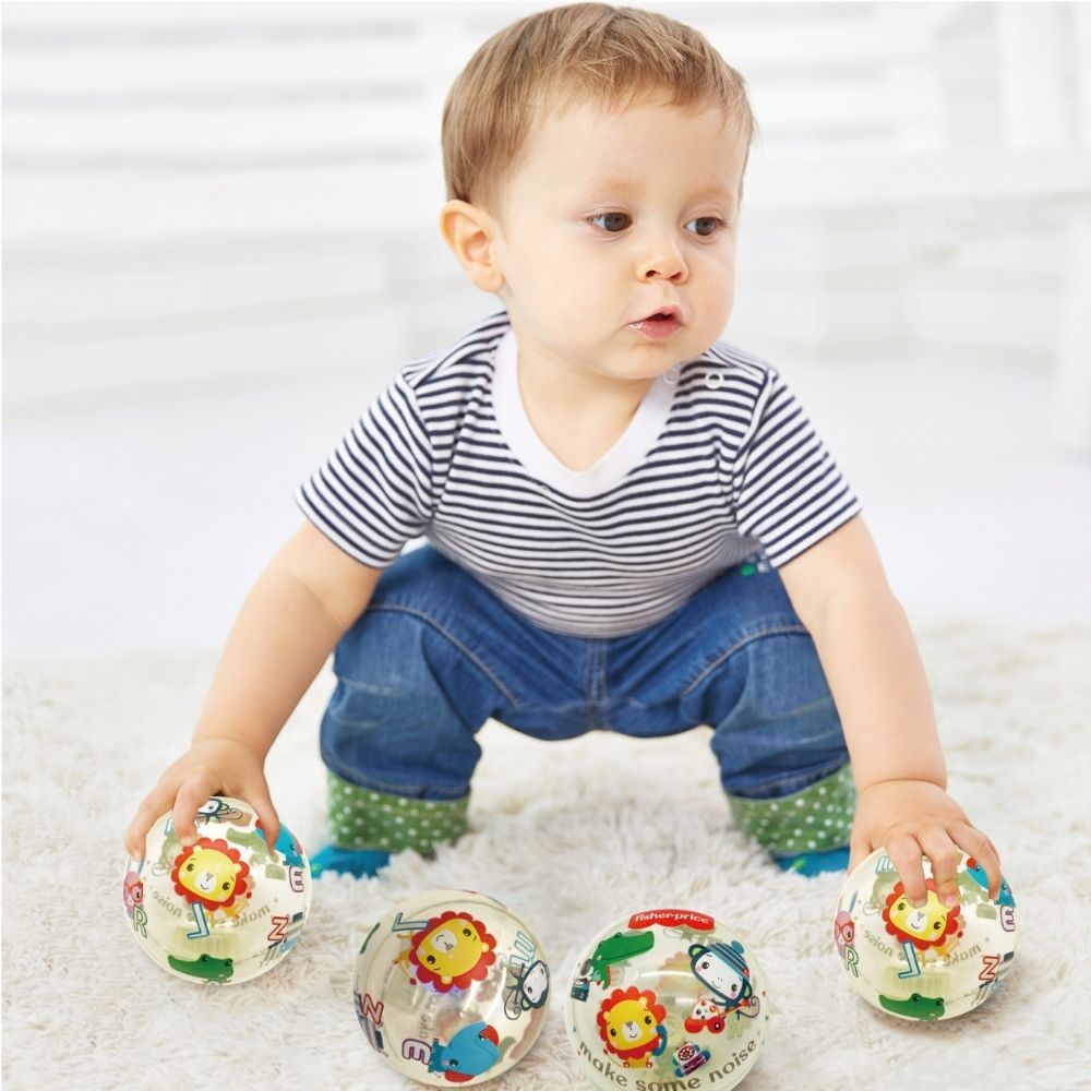 Fisher-Price 12 piece display of colorful flashing sensory balls for babies and toddlers