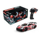 Audi RS LMS GT3 evo II remote control racing car by Carrera RC, featuring multicolor livery and a realistic steam exhaust smoke effect.