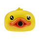 Duck Bubble Camera featuring a bright yellow duck-shaped body with a blue camera lens, a pink shutter button, and a steady stream of iridescent bubbles.