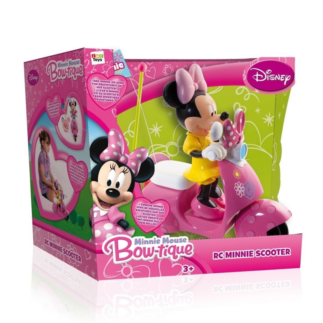 Vibrant multicolor Disney Minnie Mouse RC Scooter by IMC Toys featuring a detailed Minnie figure in a polka-dot outfit, matching helmet, and a pink-and-white remote control unit.