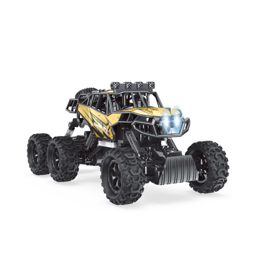 LT RC Megalodon 1:10 scale blue and silver shark-themed remote control monster truck with oversized off-road tires, high-travel suspension, and aggressive rock climbing chassis.