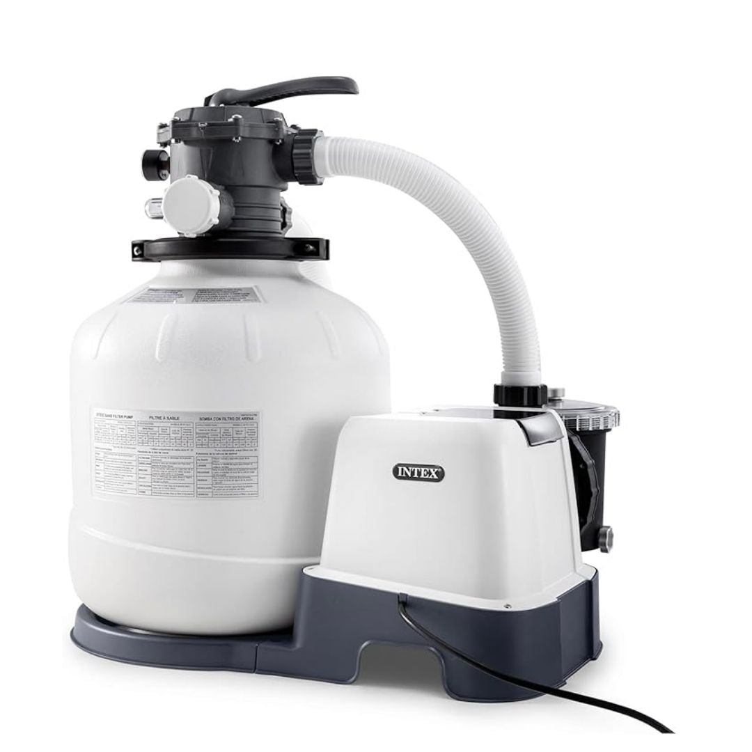 Intex 2-in-1 system featuring a large white sand filter tank, a black 6-way valve, and an integrated saltwater system unit with clear "manual" connection hoses.
