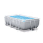 Intex Rectangular Prism Frame Pool featuring a light gray 3-ply liner and white powder-coated steel frame supports, shown with a family enjoying the water.