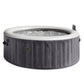 Intex PureSpa Greywood Deluxe hot tub with a realistic gray woodgrain pattern finish and an integrated digital control panel.