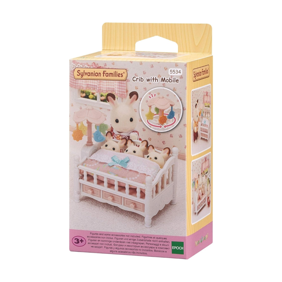 Sylvanian Families baby white crib with pink polka dot bedding and a working spinning flower dial mobile toy accessory