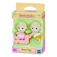 Vibrant multicolor Sylvanian Families Sheep Twins featuring two soft-flocked lamb figures in pink and yellow outfits with a small yellow push-along train.