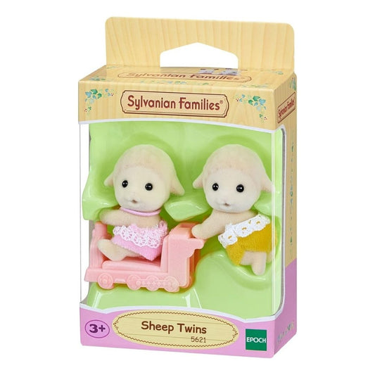 Vibrant multicolor Sylvanian Families Sheep Twins featuring two soft-flocked lamb figures in pink and yellow outfits with a small yellow push-along train.