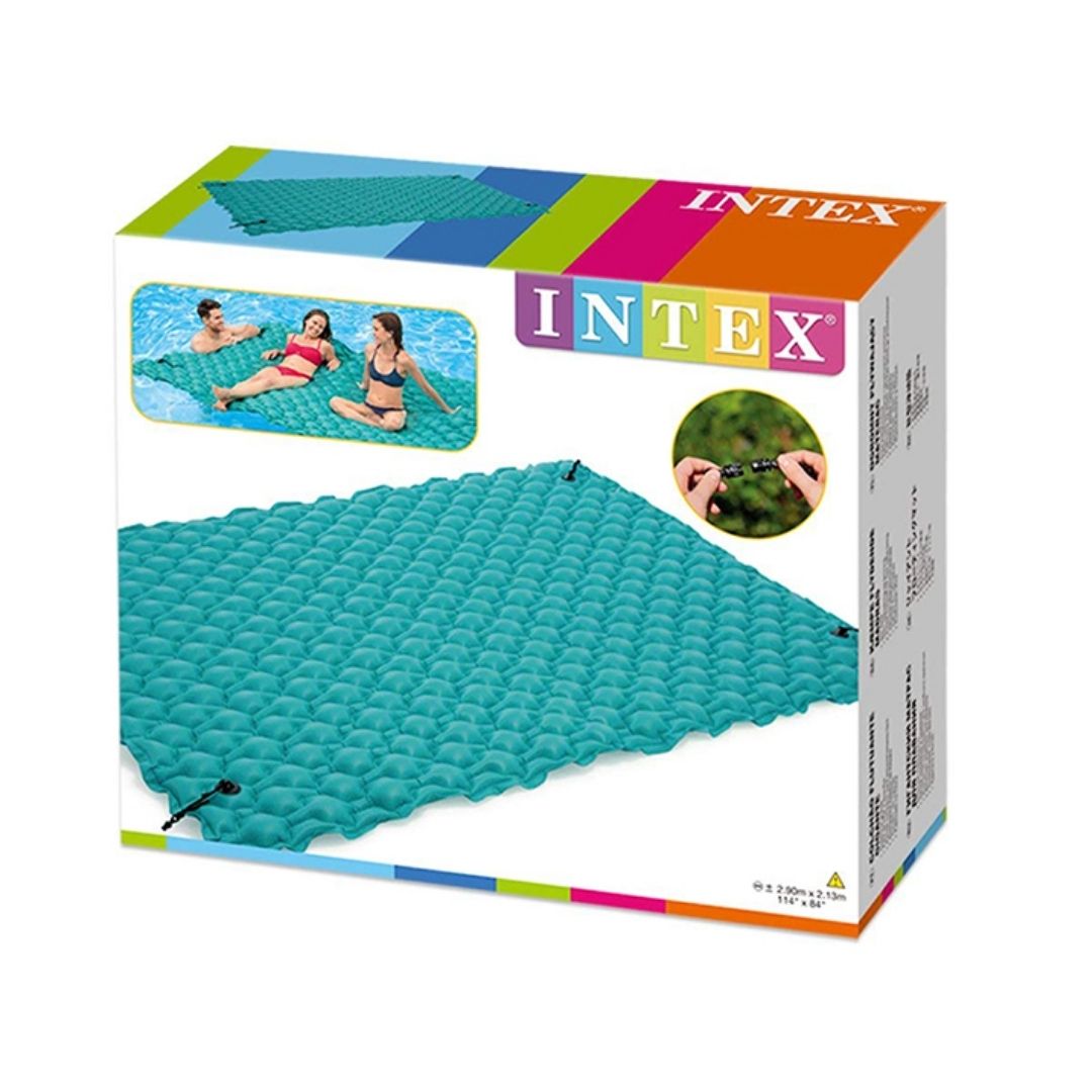 Intex inflatable floating mat on the water, featuring a wide surface area for multiple "adult" loungers and integrated connectors.