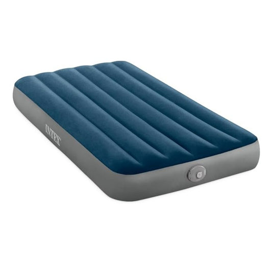 Intex Twin Prestige Downy airbed featuring a dark green flocked sleeping surface, reinforced vinyl sides, and a portable handheld battery-powered pump.