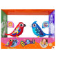 Two Silverlit DigiBirds from the Series 1 collection in vibrant multicolor finishes, featuring moving beaks, oscillating heads, and two Digi-Clip accessories for portable play.