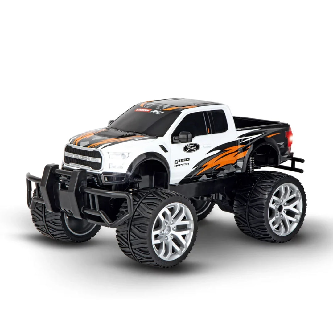 Carrera RC Ford F-150 Raptor 1:14 scale white remote control truck with flame design for off-road play