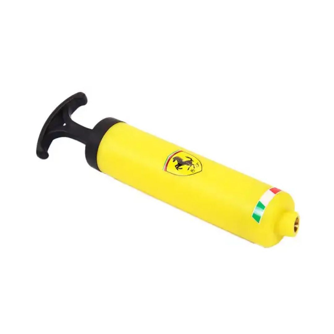 Sleek, vibrant yellow Ferrari hand pump by Mesuca, featuring the official black Ferrari Prancing Horse shield, an ergonomic textured grip, and a durable air-hose attachment.
