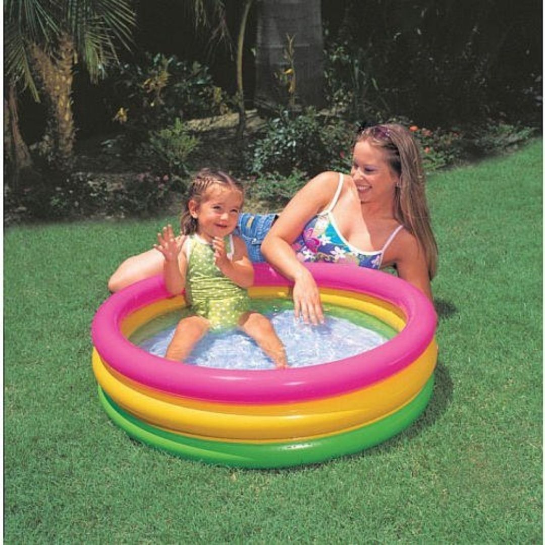 Intex Sunset Glow inflatable three-ring baby pool with colorful stripes and padded floor