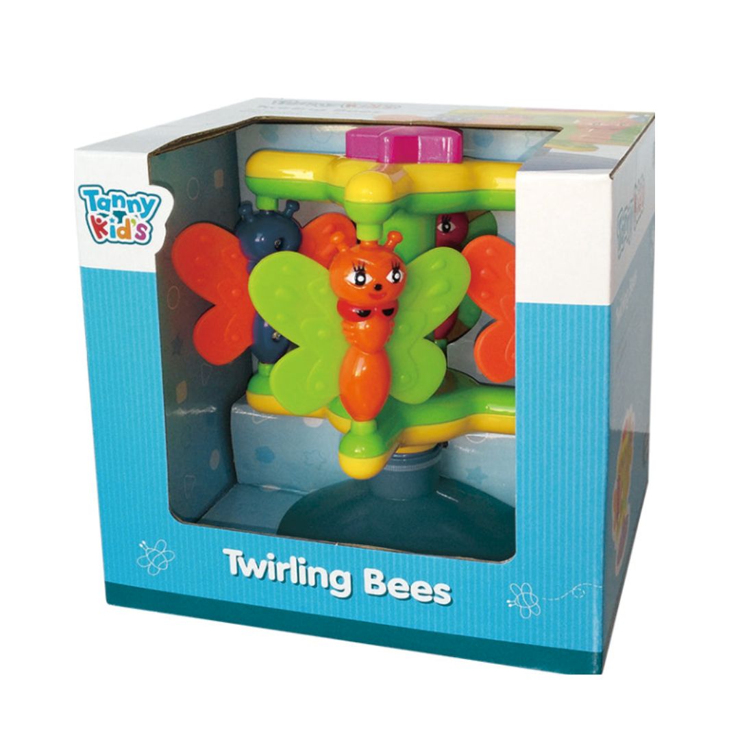 Tanny Toys Twirling Bees activity toy featuring four colorful bee characters that rotate on a central axis with a heavy-duty suction cup base for tabletop play.