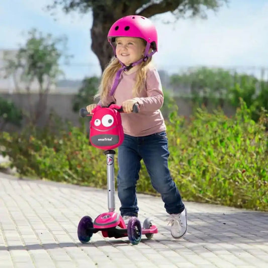 smarTrike T1 pink 3-stage toddler scooter with adjustable seat and T-lock system for outdoor play